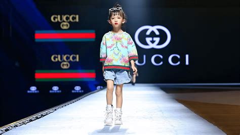 Tiny Trendsetters: Gucci Runway Extravaganza with Adorable 